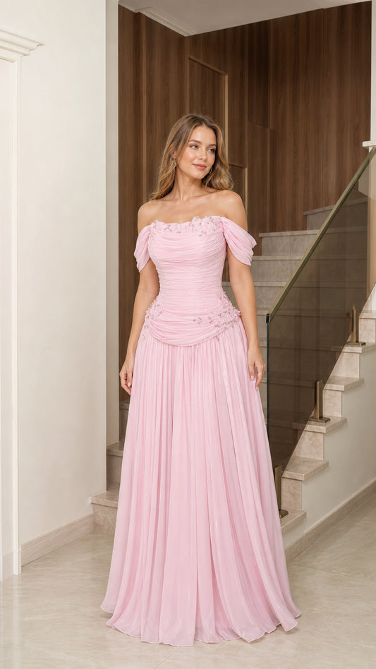 Front full-length view of woman wearing blush pink off-the-shoulder beaded evening gown