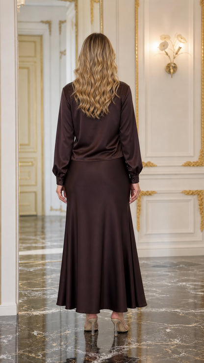 Back view of brown satin blouse and maxi skirt
