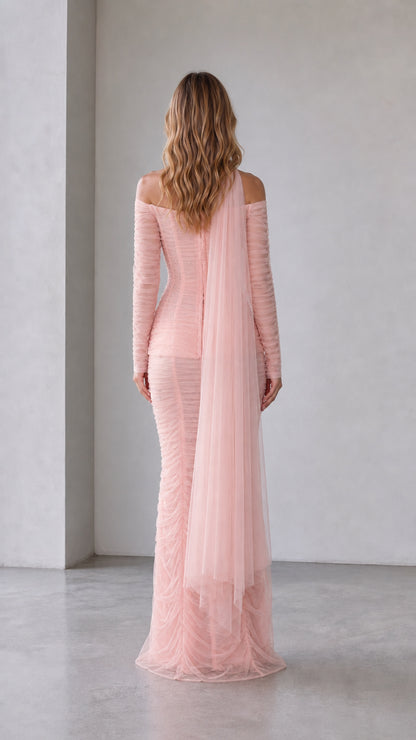 Back view of blush pink off-shoulder mermaid dress with draped tulle panels