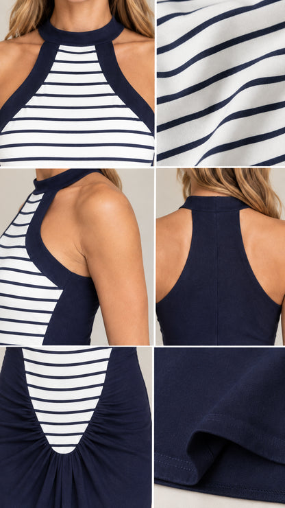 Close-up details of neckline, striped fabric, gathered waist, and hem