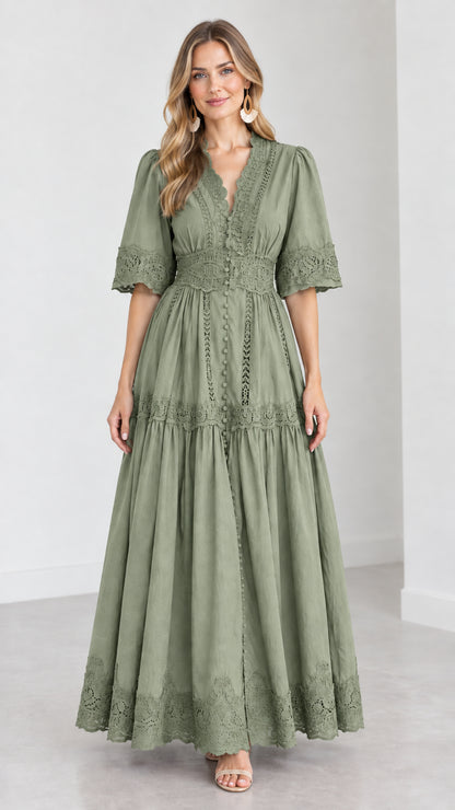 Front view of woman wearing a sage green V-neck lace trim tiered maxi dress